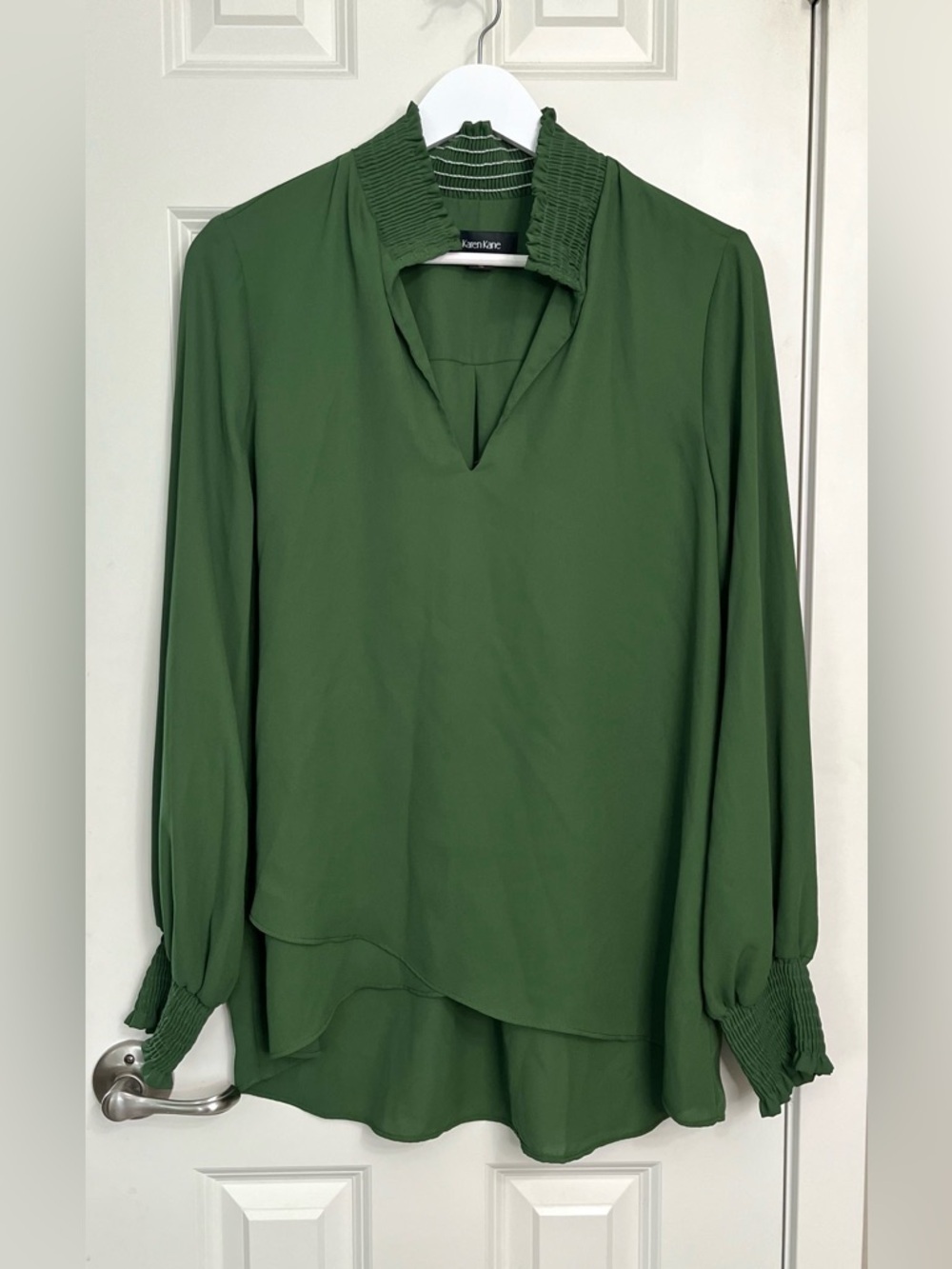 Karen Kane Smocked Collar Asymmetrical Long Sleeve
Blouse NWOT